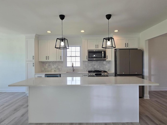 521 Parkwood Ct, Phillipsburg Town, NJ 08865 - kitchen with stainless steel appliances, a sink, white cabinets, baseboards, and recessed lighting
