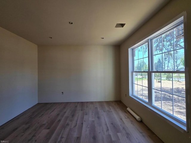 521 Parkwood Ct, Phillipsburg Town, NJ 08865 - unfurnished room featuring healthy amount of natural light and wood finished floors