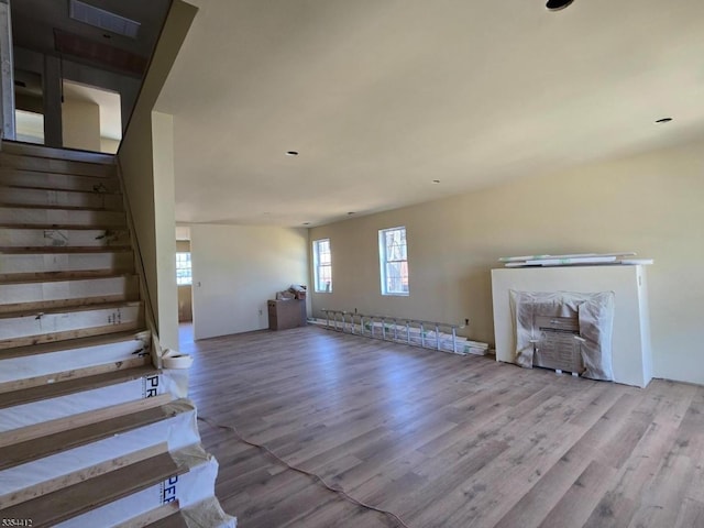 521 Parkwood Ct, Phillipsburg Town, NJ 08865 - unfurnished living room with wood finished floors and stairway