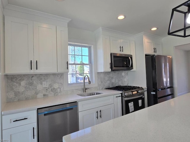 521 Parkwood Ct, Phillipsburg Town, NJ 08865 - kitchen featuring appliances with stainless steel finishes, a sink, recessed lighting, white cabinets, and backsplash