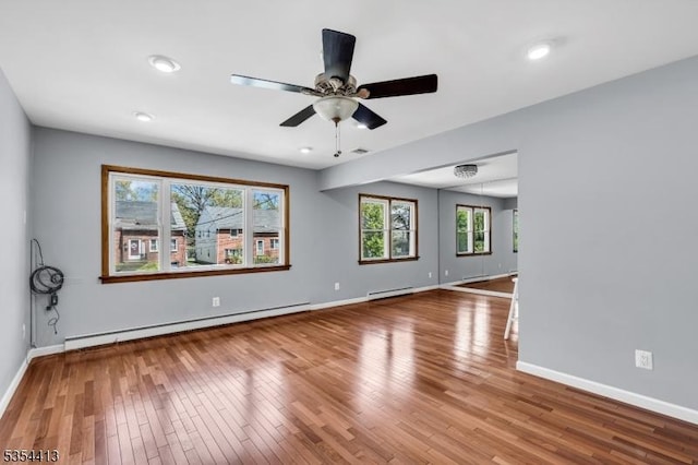 42 E Lincoln Ave, Roselle Park Boro, NJ 07204 - empty room with a baseboard radiator, hardwood / wood-style floors, baseboards, a ceiling fan, and recessed lighting
