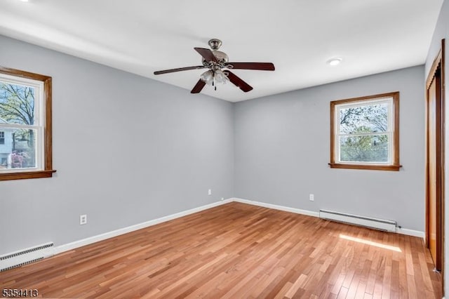 42 E Lincoln Ave, Roselle Park Boro, NJ 07204 - spare room with a baseboard radiator, healthy amount of natural light, light wood-type flooring, ceiling fan, and recessed lighting