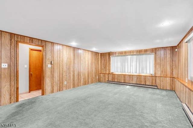 42 E Lincoln Ave, Roselle Park Boro, NJ 07204 - carpeted spare room featuring wooden walls and a baseboard radiator