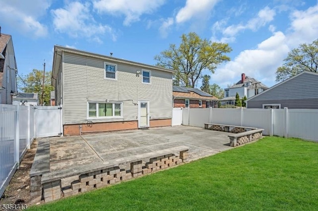 42 E Lincoln Ave, Roselle Park Boro, NJ 07204 - rear view of property with a patio area