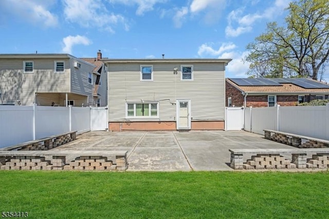 42 E Lincoln Ave, Roselle Park Boro, NJ 07204 - rear view of house featuring a patio area
