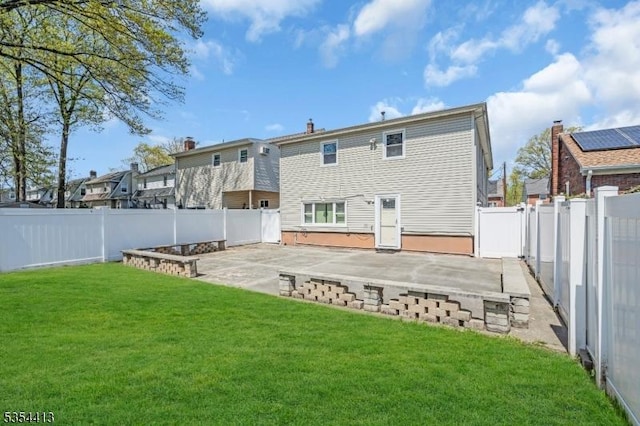 42 E Lincoln Ave, Roselle Park Boro, NJ 07204 - rear view of house featuring a patio