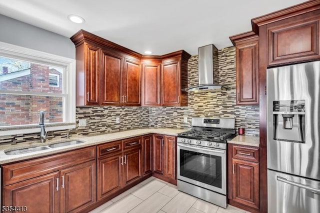 42 E Lincoln Ave, Roselle Park Boro, NJ 07204 - kitchen featuring stainless steel appliances, wall chimney range hood, a sink, and decorative backsplash