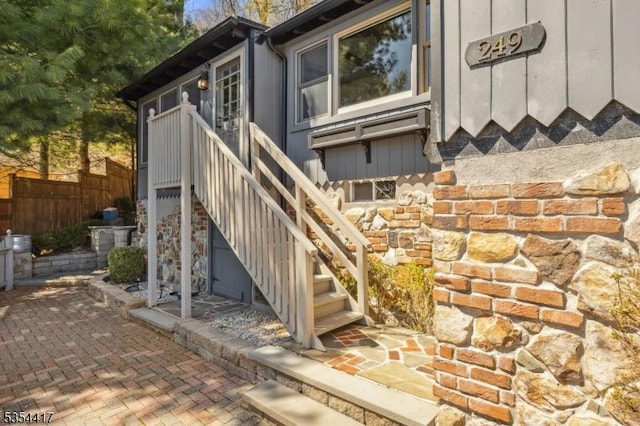 property entrance with fence