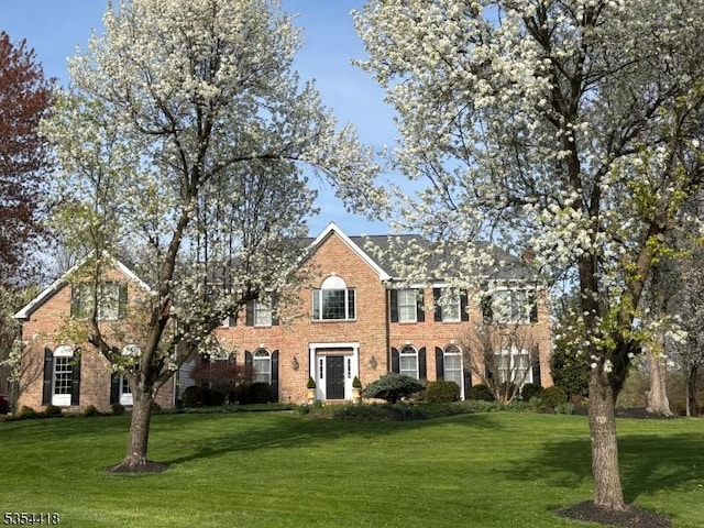 17 Hunters Path, Montgomery Twp, NJ 08558 - view of front of house with a front lawn and brick siding