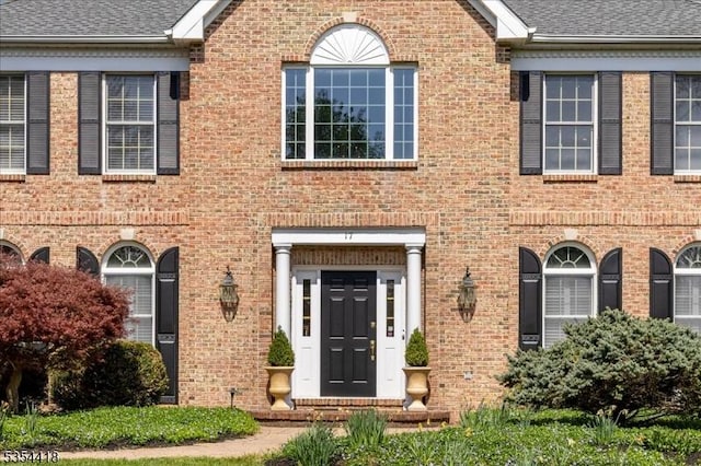 17 Hunters Path, Montgomery Twp, NJ 08558 - view of front of home featuring brick siding and a shingled roof