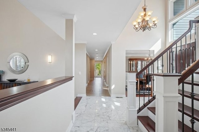 25 Hook Mountain Dr, Clinton Twp, NJ 08801 - foyer featuring baseboards, marble finish floor, and a notable chandelier