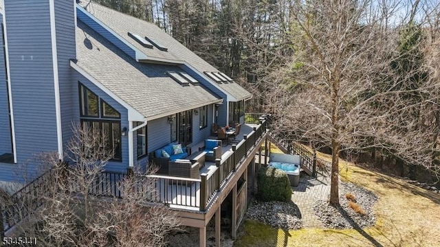 25 Hook Mountain Dr, Clinton Twp, NJ 08801 - back of property featuring an outdoor living space, a shingled roof, a chimney, and a deck