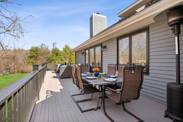 25 Hook Mountain Dr, Clinton Twp, NJ 08801 - wooden deck with outdoor dining space