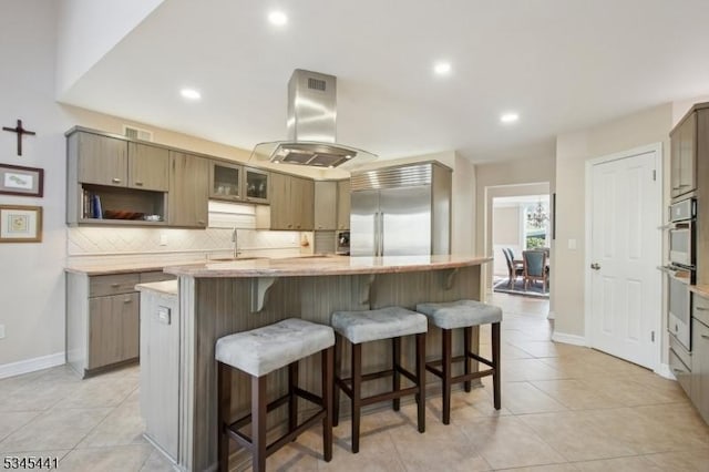 25 Hook Mountain Dr, Clinton Twp, NJ 08801 - kitchen with a kitchen breakfast bar, backsplash, island exhaust hood, a sink, and stainless steel appliances