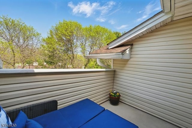 view of patio with a balcony