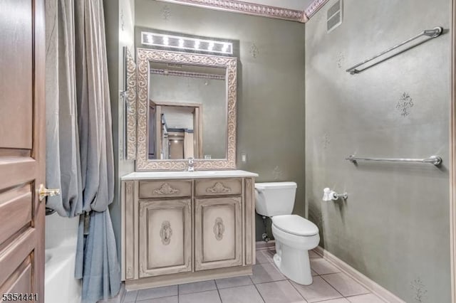 bathroom with tile patterned floors, toilet, and vanity