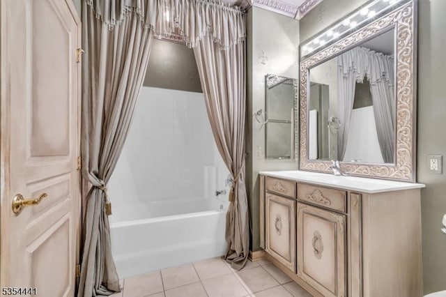 bathroom with tile patterned flooring, vanity, shower / tub combo, and toilet