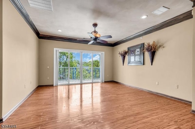 empty room featuring ornamental molding, baseboards, a ceiling fan, light wood finished floors, and recessed lighting