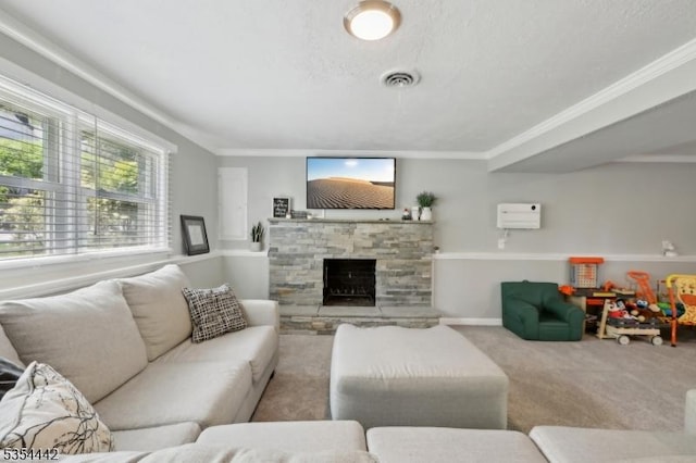 carpeted living room featuring visible vents, crown molding, and a fireplace
