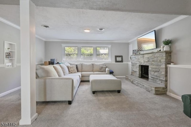 living room with baseboards, ornamental molding, carpet flooring, and a fireplace