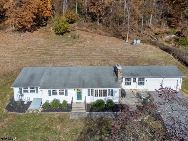 view of front of property featuring a chimney