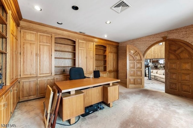 office with arched walkways, visible vents, light carpet, and recessed lighting