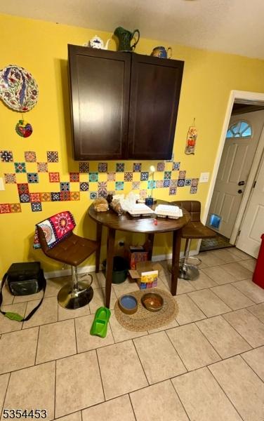 dining room with light tile patterned floors