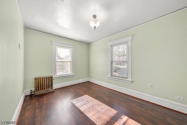104 Riggs Pl, West Orange Twp, NJ 07052 - spare room with baseboards, radiator, and a healthy amount of sunlight