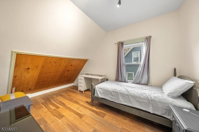 104 Riggs Pl, West Orange Twp, NJ 07052 - bedroom with vaulted ceiling and light wood-style flooring