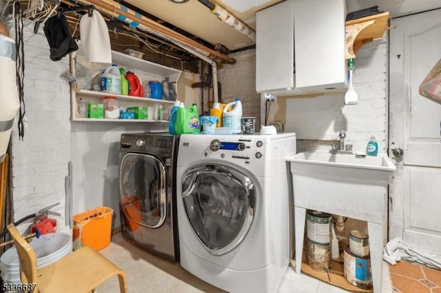 104 Riggs Pl, West Orange Twp, NJ 07052 - laundry area with cabinet space and washing machine and clothes dryer
