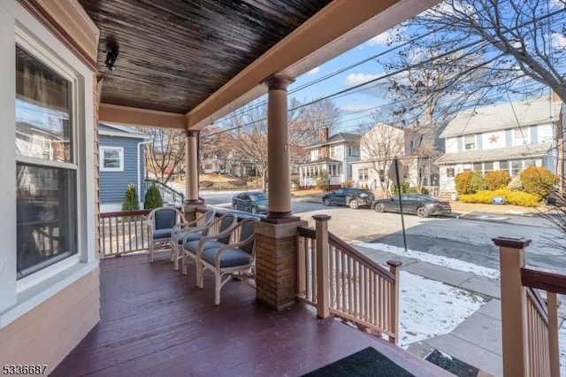104 Riggs Pl, West Orange Twp, NJ 07052 - wooden deck with covered porch and a residential view