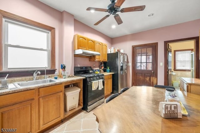 104 Riggs Pl, West Orange Twp, NJ 07052 - kitchen featuring a ceiling fan, gas range, stainless steel refrigerator with ice dispenser, under cabinet range hood, and a sink