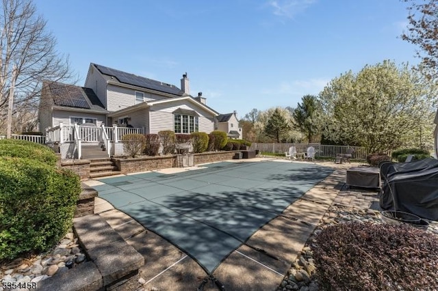 18 Higgins Farm Rd, Delaware Twp, NJ 08559 - view of swimming pool featuring a fenced in pool, a wooden deck, a patio, and fence