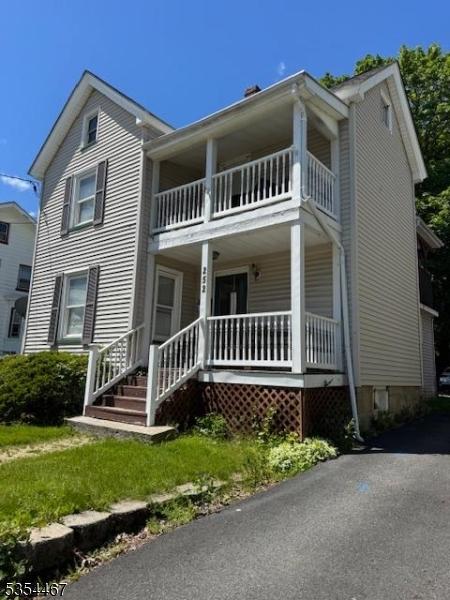 252 Spring St, Newton Town, NJ 07860 - view of front of house with a balcony and covered porch