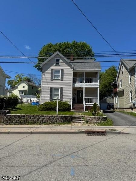 252 Spring St, Newton Town, NJ 07860 - view of front of home featuring a balcony, covered porch, and driveway