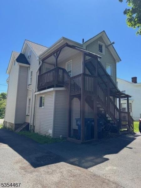 252 Spring St, Newton Town, NJ 07860 - view of front of home featuring stairs and a balcony