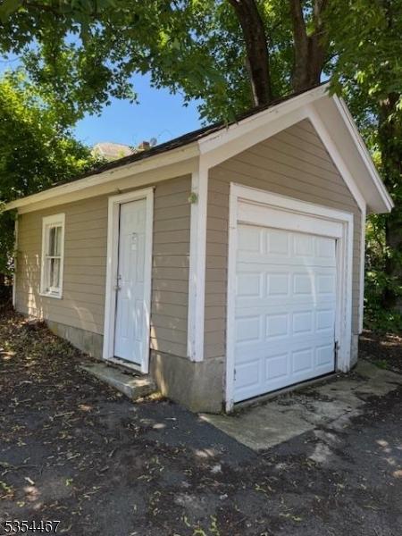 252 Spring St, Newton Town, NJ 07860 - detached garage featuring asphalt driveway
