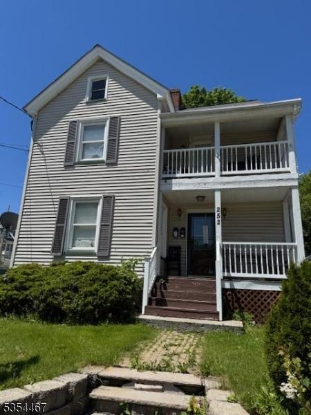 252 Spring St, Newton Town, NJ 07860 - back of property with a balcony and a porch
