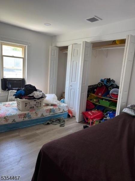252 Spring St, Newton Town, NJ 07860 - bedroom featuring wood finished floors and cooling unit