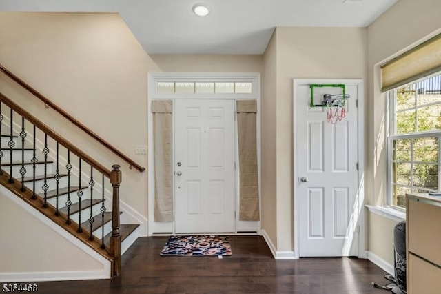 entrance foyer featuring stairway, baseboards, recessed lighting, and wood finished floors