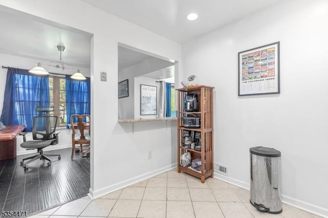 corridor featuring baseboards, recessed lighting, and visible vents