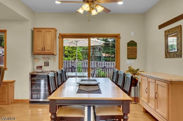 8 Katherine St, Denville Twp, NJ 07834 - dining room featuring beverage cooler, ceiling fan, light wood finished floors, and plenty of natural light