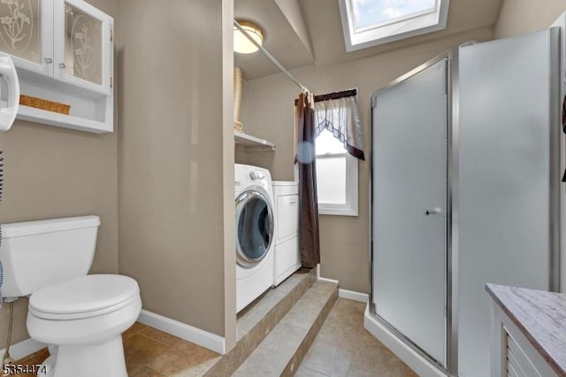 8 Katherine St, Denville Twp, NJ 07834 - full bath with a shower stall, washer / clothes dryer, a skylight, and tile patterned floors