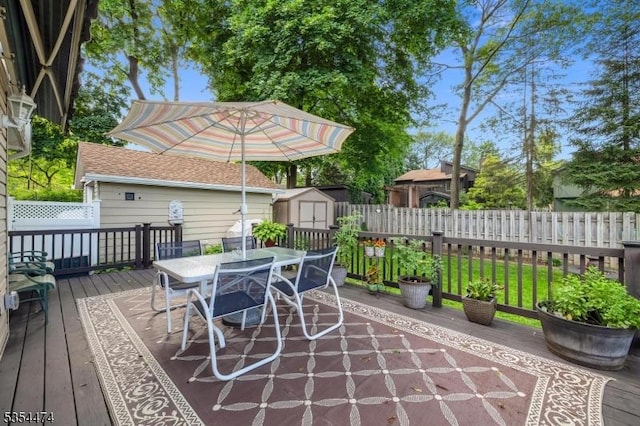 8 Katherine St, Denville Twp, NJ 07834 - deck with a storage shed and outdoor dining space