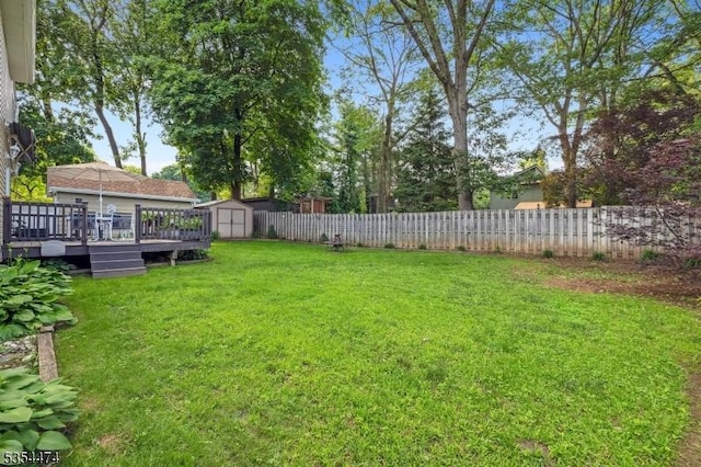 8 Katherine St, Denville Twp, NJ 07834 - fenced backyard with a shed and a wooden deck