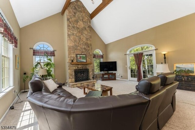 11 Southgate Dr, Clinton Twp, NJ 08801 - living room featuring a fireplace, light carpet, baseboards, and high vaulted ceiling