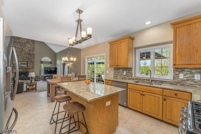 11 Southgate Dr, Clinton Twp, NJ 08801 - kitchen featuring a notable chandelier, stainless steel appliances, tasteful backsplash, and a kitchen island