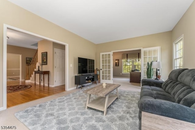 11 Southgate Dr, Clinton Twp, NJ 08801 - living area with wood finished floors, french doors, baseboards, and stairs