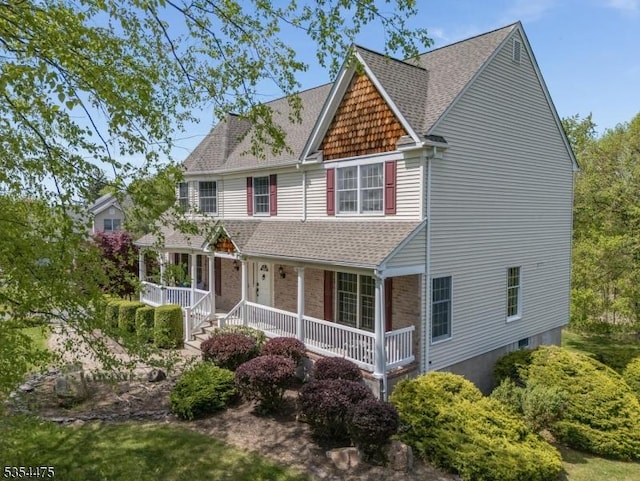 11 Southgate Dr, Clinton Twp, NJ 08801 - view of front of property featuring a porch and a shingled roof