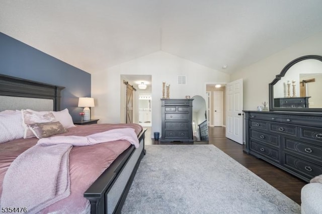 bedroom with visible vents, dark wood-style flooring, ensuite bathroom, and vaulted ceiling